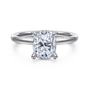 Gabriel & Co. ER15972G8W44JJ 14 karat white gold Classic engagement ring, front view of an elongated cushion center in four teardrop tipped prongs on a polished band