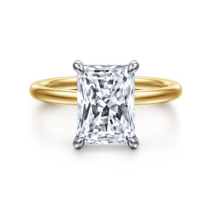 Gabriel & Co. ER15972N12M44JJ 14 karat white and yellow gold Classic engagement ring, front view of a radiant cut center in rounded corner claws above a smooth polished band