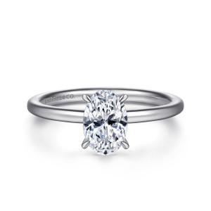 Gabriel & Co. ER15972O4W44JJ 14 karat white gold Classic engagement ring, front view of an oval center on slim prongs above a thin smooth band with no halo showing