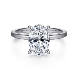 Gabriel & Co. ER15972O8PT4JJ platinum Classic engagement ring, front view of an oval center on a smooth band with no stones along it