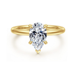 Gabriel & Co. ER15972P6Y44JJ 14 karat yellow gold Classic engagement ring, front view of a pear shaped center with a V shaped prong at its pointed tip
