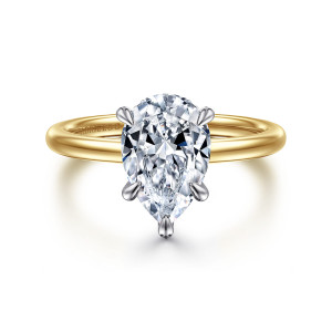Gabriel & Co. ER15972P8M44JJ 14 karat white and yellow gold Classic engagement ring, front view of a pear shaped center in pointed claw prongs above a smooth plain band