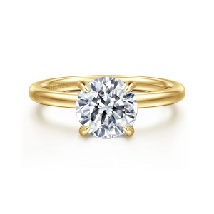 Gabriel & Co. ER15972R6Y44JJ 14 karat yellow gold Classic engagement ring, front view of a round center in four rounded tip claws on a slim smooth band