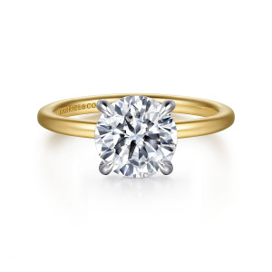 Gabriel & Co. ER15972R8M44JJ 14 karat white and yellow gold Classic engagement ring, front view of four slim claws around a round center on a thin, smooth, warmer band