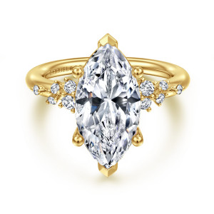Gabriel & Co. ER15973M16Y44JJ 14 karat yellow gold Starlight engagement ring, front view of a marquise center with V shaped tips and diamond clusters on each shoulder