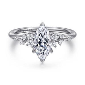 Gabriel & Co. ER15973M4W44JJ 14 karat white gold Starlight engagement ring, front view of a marquise center with V shaped tips at both points and diamond clusters beside it