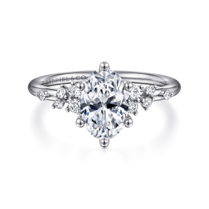 Gabriel & Co. ER15973O6W44JJ 14 karat white gold Starlight engagement ring, front view of an oval center with six ball tipped prongs and loose diamond groups on both shoulders