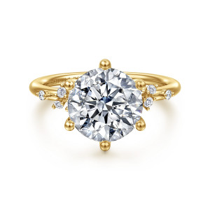 Gabriel & Co. ER15973R12Y44JJ 14 karat yellow gold Starlight engagement ring, front view of a large round center ringed by ball tipped prongs with small diamonds on each side