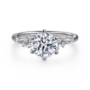 Gabriel & Co. ER15973R6W44JJ 14 karat white gold Starlight engagement ring, front view of a round center among ball tipped prongs with diamonds scattered at each shoulder