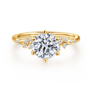 Gabriel & Co. ER15973R6Y84JJ 18 karat yellow gold Starlight engagement ring, front view of a round center on ball tipped prongs with diamonds hugging its sides
