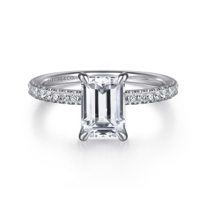 Gabriel & Co. ER16058E8W44JJ 14 karat white gold Classic engagement ring, front view of an emerald cut center in four claws with small round diamonds on both shoulders