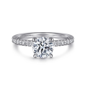 Gabriel & Co. ER16058R4W44JJ 14 karat white gold Classic engagement ring, front view of a round center in four tapered prongs with diamonds flanking each side