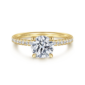 Gabriel & Co. ER16058R6Y44JJ 14 karat yellow gold Classic engagement ring, front view of a round center on tapered claw prongs between scalloped pave shoulders