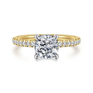Gabriel & Co. ER16059C6M44JJ 14 karat white and yellow gold Classic engagement ring, front view of a cushion cut center with four prongs above a slim band of small round diamonds