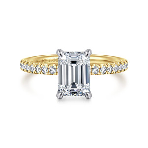 Gabriel & Co. ER16059E6M44JJ 14 karat white and yellow gold Classic engagement ring, front view of an emerald cut center with pave diamonds along the shoulders of a slim band