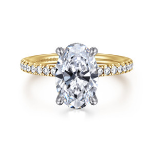 Gabriel & Co. ER16059O10M44JJ 14 karat white and yellow gold Classic engagement ring, front view of an oval center in claw prongs above a thin band of small round diamonds