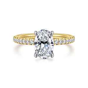 Gabriel & Co. ER16059O6M44JJ 14 karat white and yellow gold Classic engagement ring, front view of an oval center in four claw prongs above a thin band of small round diamonds