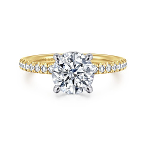 Gabriel & Co. ER16059R6M44JJ 14 karat white and yellow gold Classic engagement ring, front view of a round center on four prongs above a thin band of small stones
