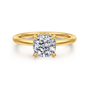 Gabriel & Co. ER16061C6Y84JJ 18 karat yellow gold Classic engagement ring, front view of a cushion cut center in four rounded tip prongs with tiny diamonds glimpsed beneath