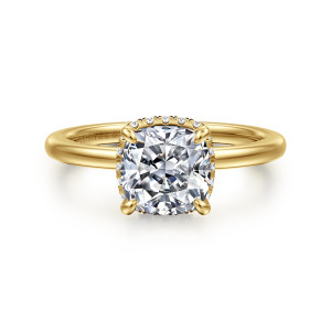 Gabriel & Co. ER16061C8Y44JJ 14 karat yellow gold Classic engagement ring, front view of a cushion cut center with small diamonds just peeking out beneath its edges