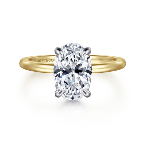 Gabriel & Co. ER16061O8M44JJ 14 karat white and yellow gold Classic engagement ring, front view of an oval center on four rounded prongs above a thin smooth band