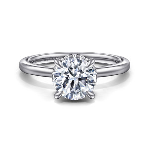 Gabriel & Co. ER16061R6PT4JJ platinum Classic engagement ring, front view of a round center in four rounded claws with a few small diamonds glimpsed behind