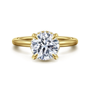 Gabriel & Co. ER16061R8Y44JJ 14 karat yellow gold Classic engagement ring, front view of a round center in four claws with tiny diamonds glinting at its rim