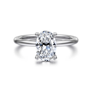 Gabriel & Co. ER16117O6W44JJ 14 karat white gold Classic engagement ring, front view of an oval center held by prongs with round ball tips