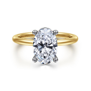 Gabriel & Co. ER16117O8M44JJ 14 karat white and yellow gold Classic engagement ring, front view of an oval center held by four ball tipped prongs on a slim band