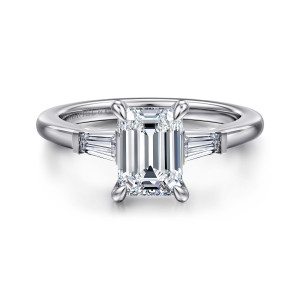 Gabriel & Co. ER16121E6W43JJ 14 karat white gold Classic engagement ring, front view of an emerald cut center between tapered side stones in squared cradles
