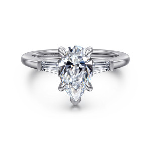 Gabriel & Co. ER16121P6W43JJ 14 karat white gold Classic engagement ring, front view of the pear center with a tapered baguette in a squared mount on each shoulder