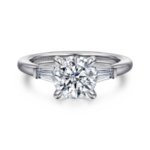Gabriel & Co. ER16121R6W43JJ 14 karat white gold Classic engagement ring, front view of tapered baguettes running along the shoulders on either side of a round center