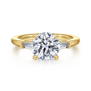 Gabriel & Co. ER16121R8Y43JJ 14 karat yellow gold Classic engagement ring, front view of a round center flanked by two tapered baguettes held between small end bars