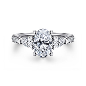 Gabriel & Co. ER16122O6W44JJ 14 karat white gold Contemporary engagement ring, front view of an upright oval center flanked by pear shaped side stones with points aimed outward