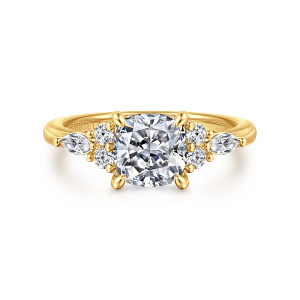 Gabriel & Co. ER16125C6Y84JJ 18 karat yellow gold Contemporary engagement ring, front view of a cushion cut center with round and elongated side stones fanning outward