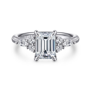 Gabriel & Co. ER16125E6W84JJ 18 karat white gold Contemporary engagement ring, front view of an emerald cut center with a cluster of round and elongated diamonds on each side