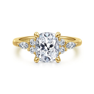 Gabriel & Co. ER16125G8Y44JJ 14 karat yellow gold Contemporary engagement ring, front view of an elongated cushion center flanked by clusters of round and elongated small diamonds