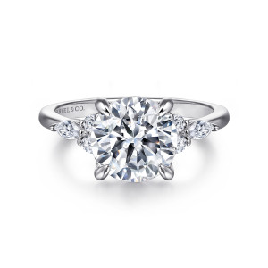 Gabriel & Co. ER16125R12PT4JJ platinum Contemporary engagement ring, front view of a round center with a cluster of small round and elongated diamonds on each side