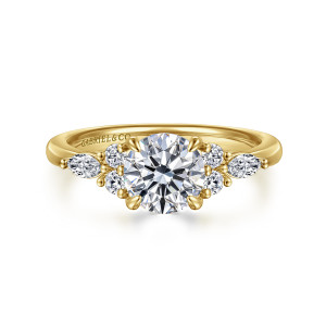 Gabriel & Co. ER16125R4Y44JJ 14 karat yellow gold Contemporary engagement ring, front view of a round center with rounded prong tips and a diamond cluster on each side