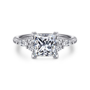 Gabriel & Co. ER16125S6W44JJ 14 karat white gold Contemporary engagement ring, front view of a square center held by chevron shaped corner prongs between two diamond clusters