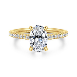 Gabriel & Co. ER16129O6Y44JJ 14 karat yellow gold Contemporary engagement ring, front view of an oval center in four ball tipped prongs with diamonds along both shoulders