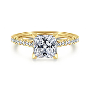 Gabriel & Co. ER16129S6Y44JJ 14 karat yellow gold Contemporary engagement ring, front view of a princess cut center gripped at its corners with diamonds along the shoulders