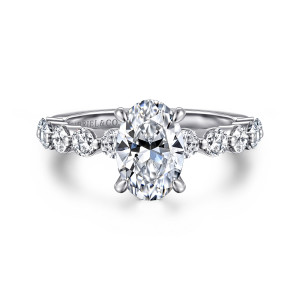 Gabriel & Co. ER16130O6W44JJ 14 karat white gold Classic engagement ring, front view of an oval center with round diamonds in small cups on both shoulders