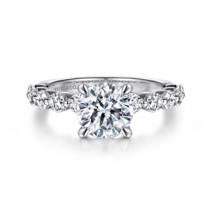 Gabriel & Co. ER16130R8W44JJ 14 karat white gold Classic engagement ring, front view of a round center flanked by smaller round diamonds beside the head