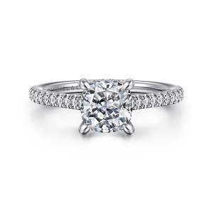 Gabriel & Co. ER16131C6W44JJ 14 karat white gold Classic engagement ring, front view of a cushion shaped center between rounded prongs with diamonds along both shoulders