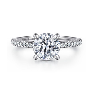 Gabriel & Co. ER16131R6W44JJ 14 karat white gold Classic engagement ring, front view of a round center in tapered prongs with diamonds along both shoulders