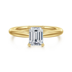 Gabriel & Co. ER16132E4Y4JJJ 14 karat yellow gold Classic engagement ring, front view of an emerald cut center held by slim corner claws above a smooth tapered band