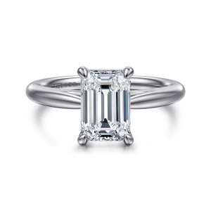 Gabriel & Co. ER16132E8W4JJJ 14 karat white gold Classic engagement ring, front view of an emerald cut center held by four rounded prongs at its corners
