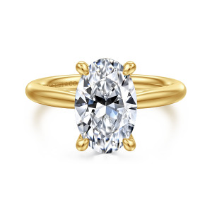 Gabriel & Co. ER16132O12Y4JJJ 14 karat yellow gold Classic engagement ring, front view of an oval center held by four teardrop tipped prongs above a smooth band
