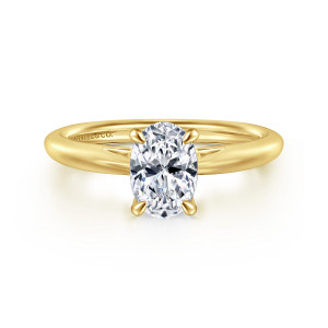Gabriel & Co. ER16132O4Y4JJJ 14 karat yellow gold Classic engagement ring, front view of an oval center held by four slim prongs above a smooth tapered band